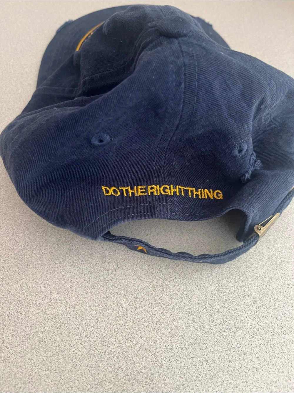 Embroidered Navy Cap with Gold Logo - 